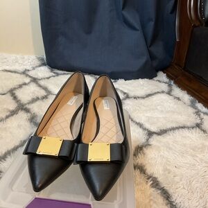 Elegant Black Women's Shoes with Gold Accents